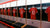 Displayed Manchester United Kits Hanging in the Team Locker Room