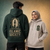 Two students wearing University of Birmingham Islamic Society hoodies.
