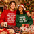 man and women wearing custom christmas jumpers