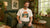 A man wearing a crewneck unisex organic t-shirts with a valley graphic print on the chest.