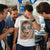 Man wearing a funny birthday photo T-shirt at a party