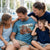 Father wearing a custom family photo T-shirt