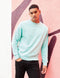 male model in AWDis sweatshirt in city